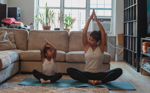 Two people stretching