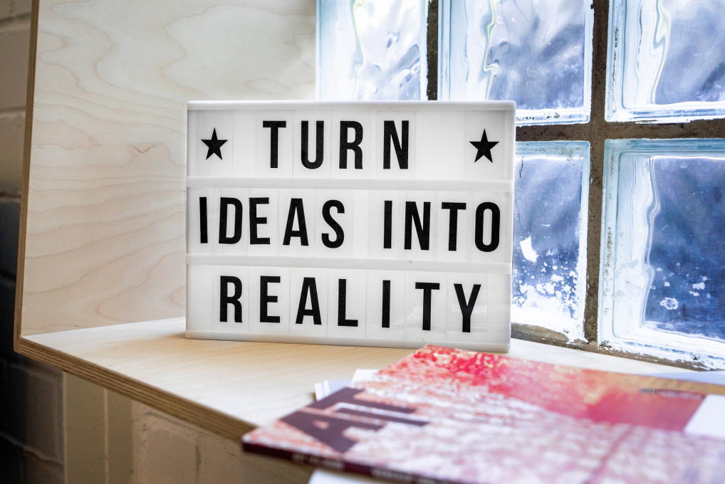 Image of a Sign saying Turn Ideas into Reality